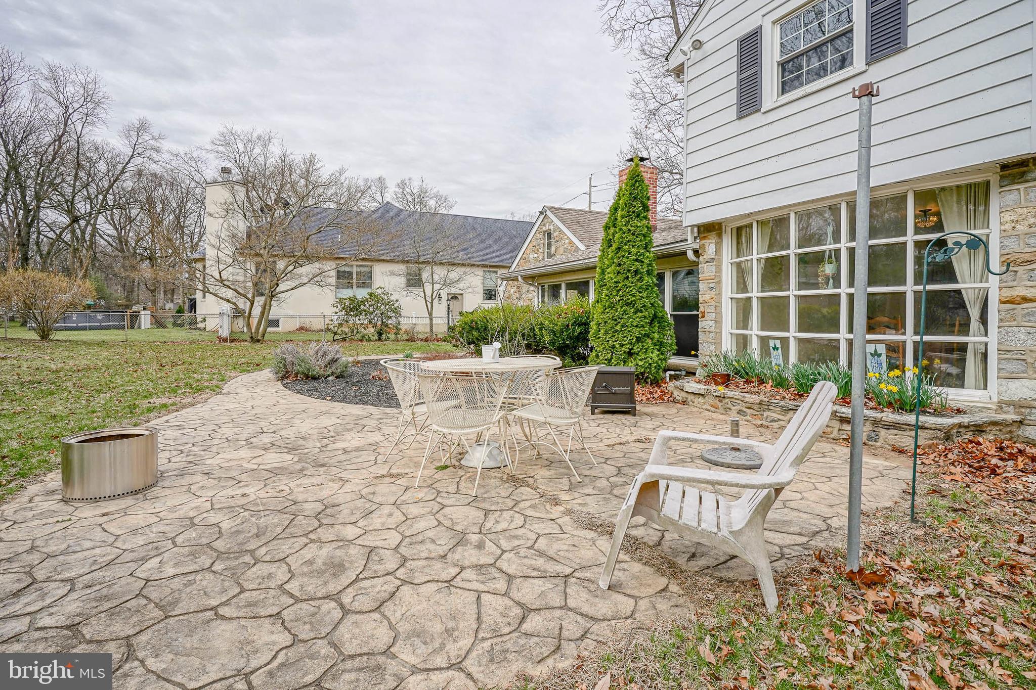64 Pancoast Boulevard Delran, NJ 08075 - Photo 41 of 45 a view of a patio with table and chairs near a yard