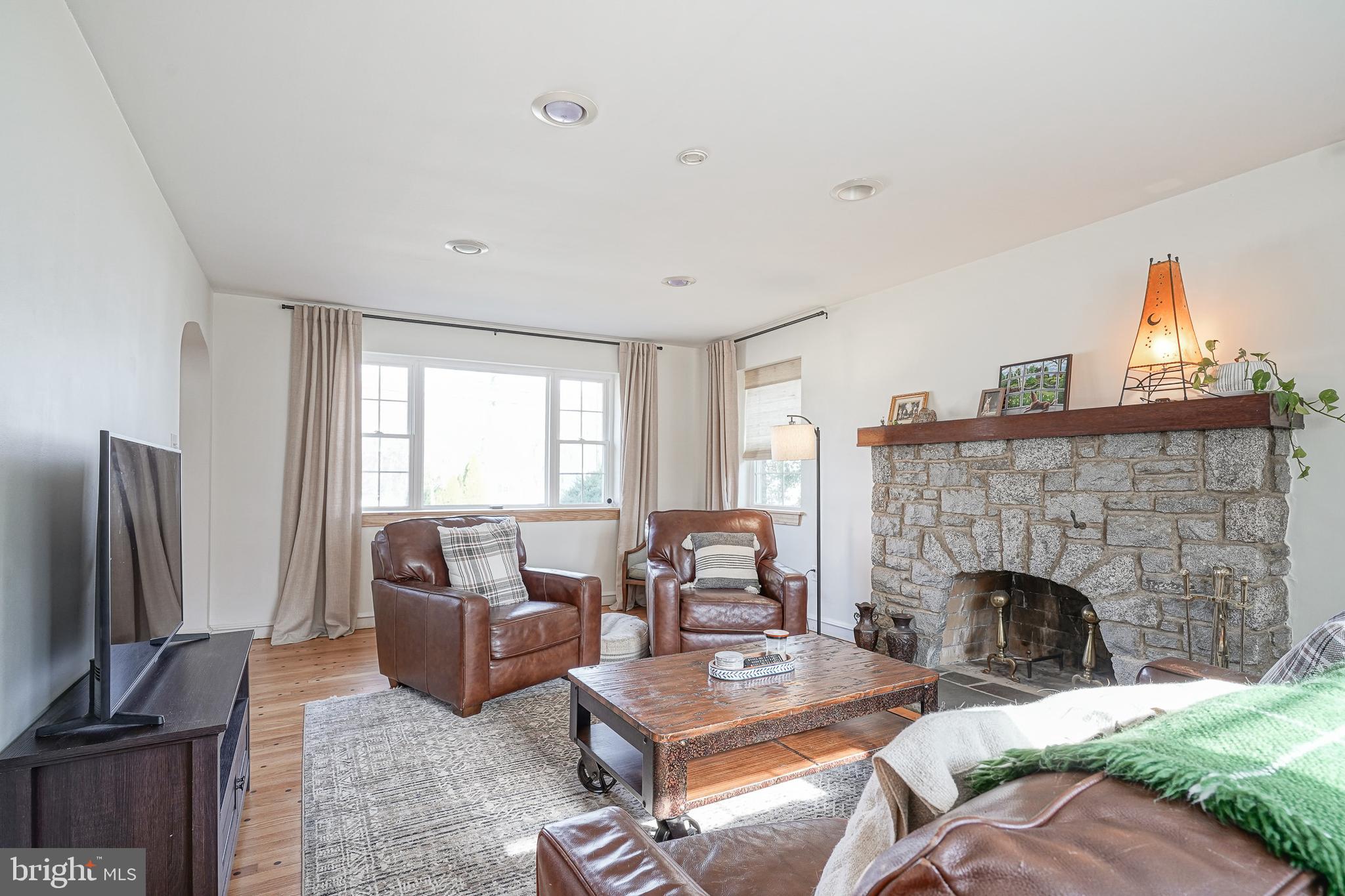 64 Pancoast Boulevard Delran, NJ 08075 - Photo 8 of 45 a living room with furniture a fireplace and a flat screen tv