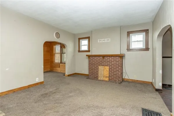 an empty room with windows