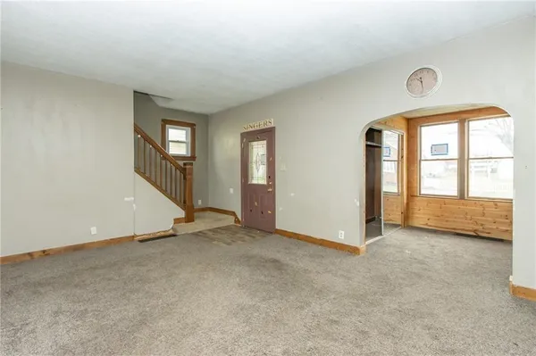 an empty room with windows