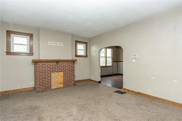 an empty room with windows