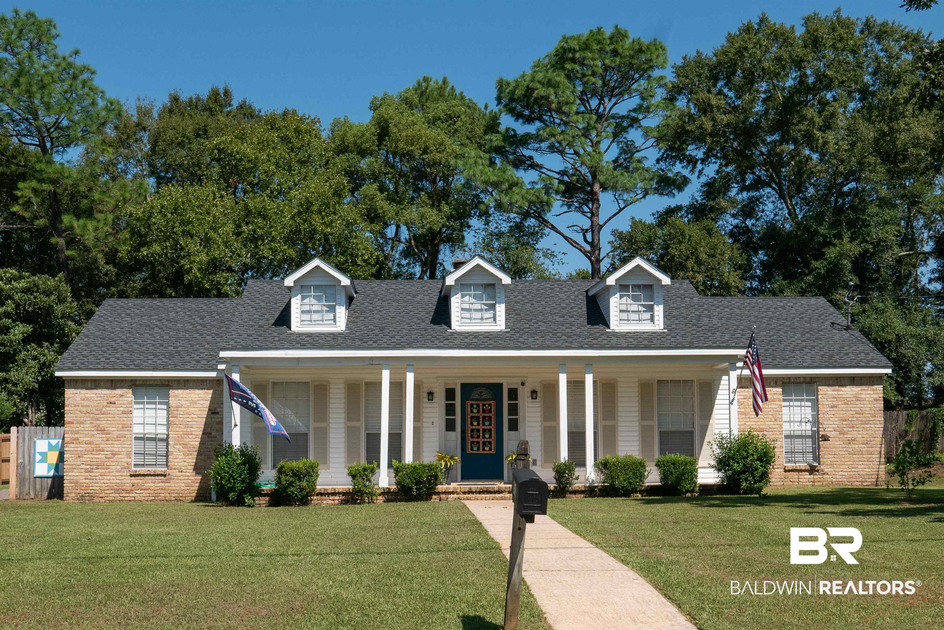 630 Spanish Main Daphne, AL 36527 - Photo 40 of 40 Cape cod-style house featuring a porch and a front lawn