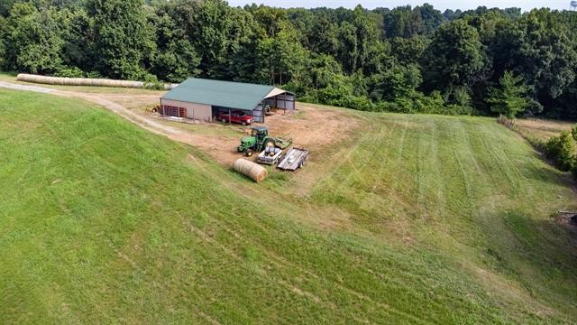 3854 Edith-Nankipoo Road Ripley, TN 38063 - Photo 12 of 15 an aerial view of a house with garden space and trees all around