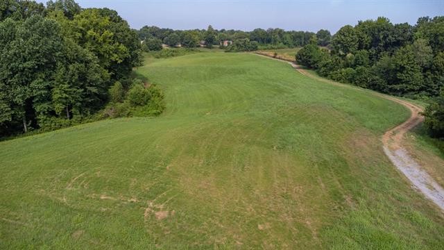 3854 Edith-Nankipoo Road Ripley, TN 38063 - Photo 13 of 15 a view of a field with an trees in the background