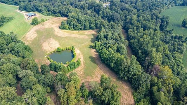 3854 Edith-Nankipoo Road Ripley, TN 38063 - Photo 4 of 15 an aerial view of residential house with outdoor space and trees all around