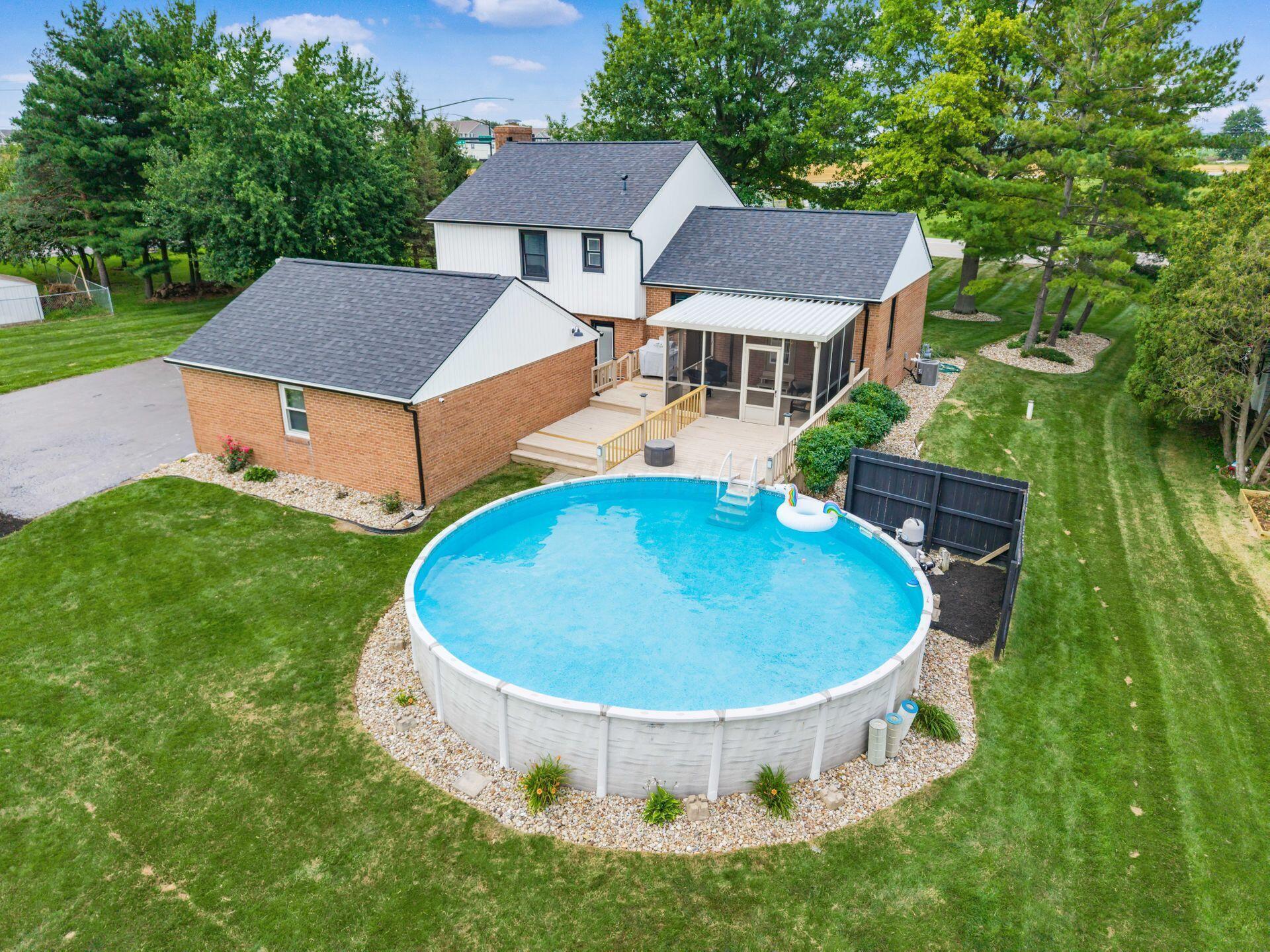 16707 County Home Road Marysville, OH 43040 - Photo 5 of 52 Beautiful sunroom, deck and POOL!