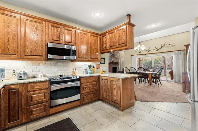 a room with furniture a shelf and a book shelf
