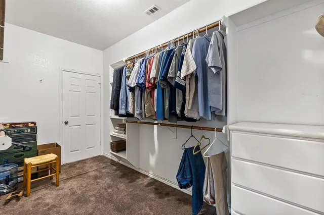 a bathroom with a sink a mirror and a light fixture