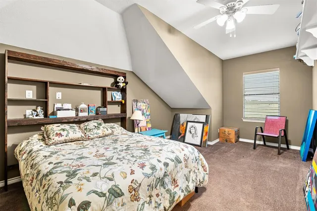 a view of swimming pool with outdoor seating and yard in back