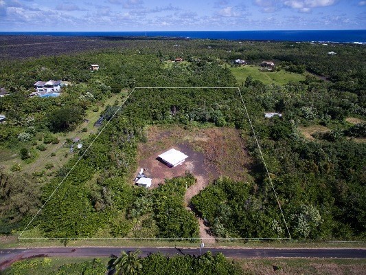 a view of a lush green field