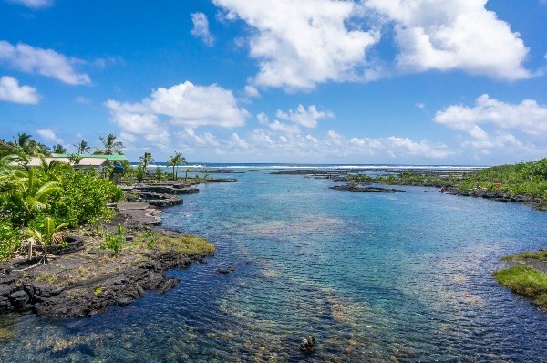 14-4825 La Maloo Road Pahoa, HI 96778 - Photo 2 of 25 a view of a lake with houses in the back