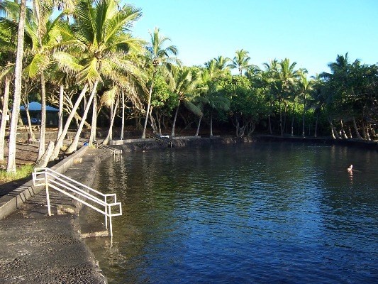 14-4825 La Maloo Road Pahoa, HI 96778 - Photo 3 of 25 a backyard of a house with lots of green space and lake view