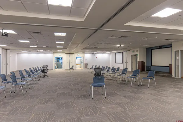 a large room with gym equipment