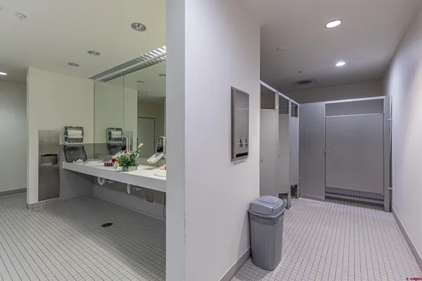 a view of parking garage with cars