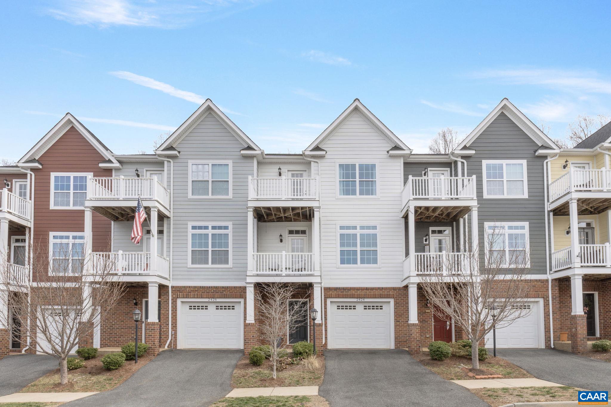 a front view of a building with many windows