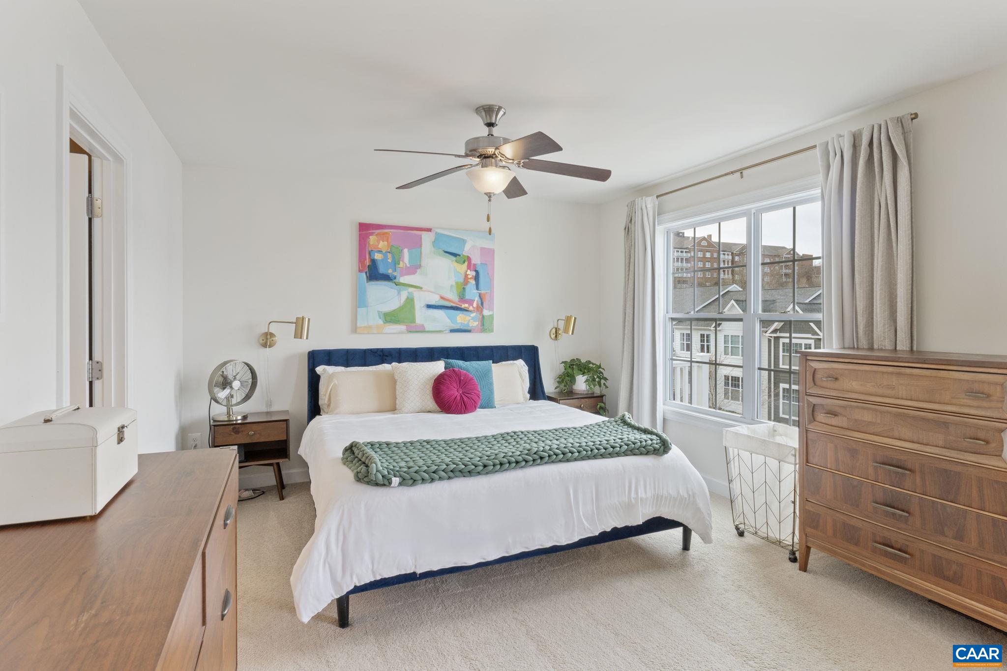 2424 Winthrop Drive Charlottesville, VA 22911 - Photo 16 of 36 a bedroom with a bed chandelier and a window