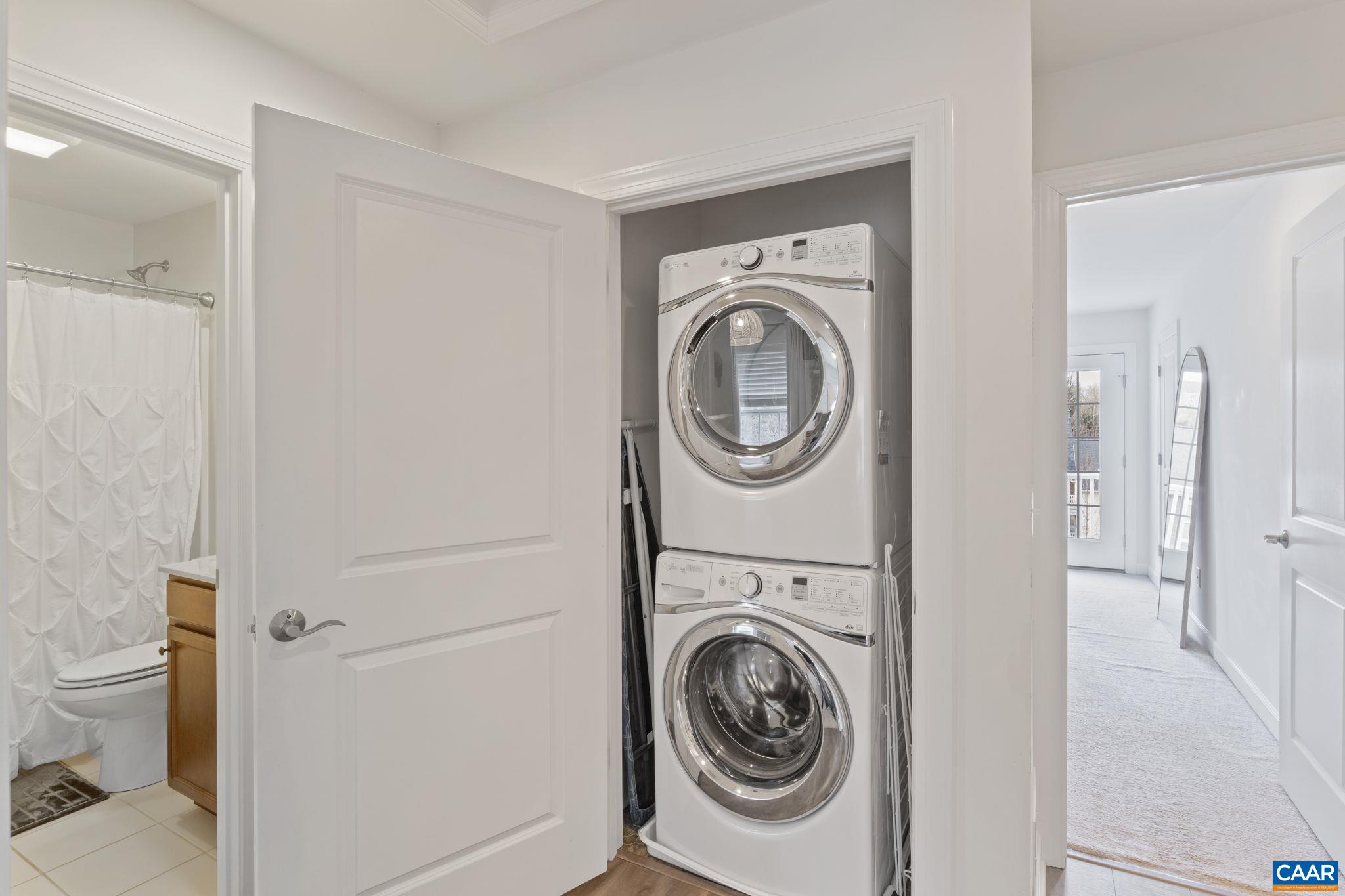 2424 Winthrop Drive Charlottesville, VA 22911 - Photo 22 of 36 a view of a bathroom with a washer and dryer