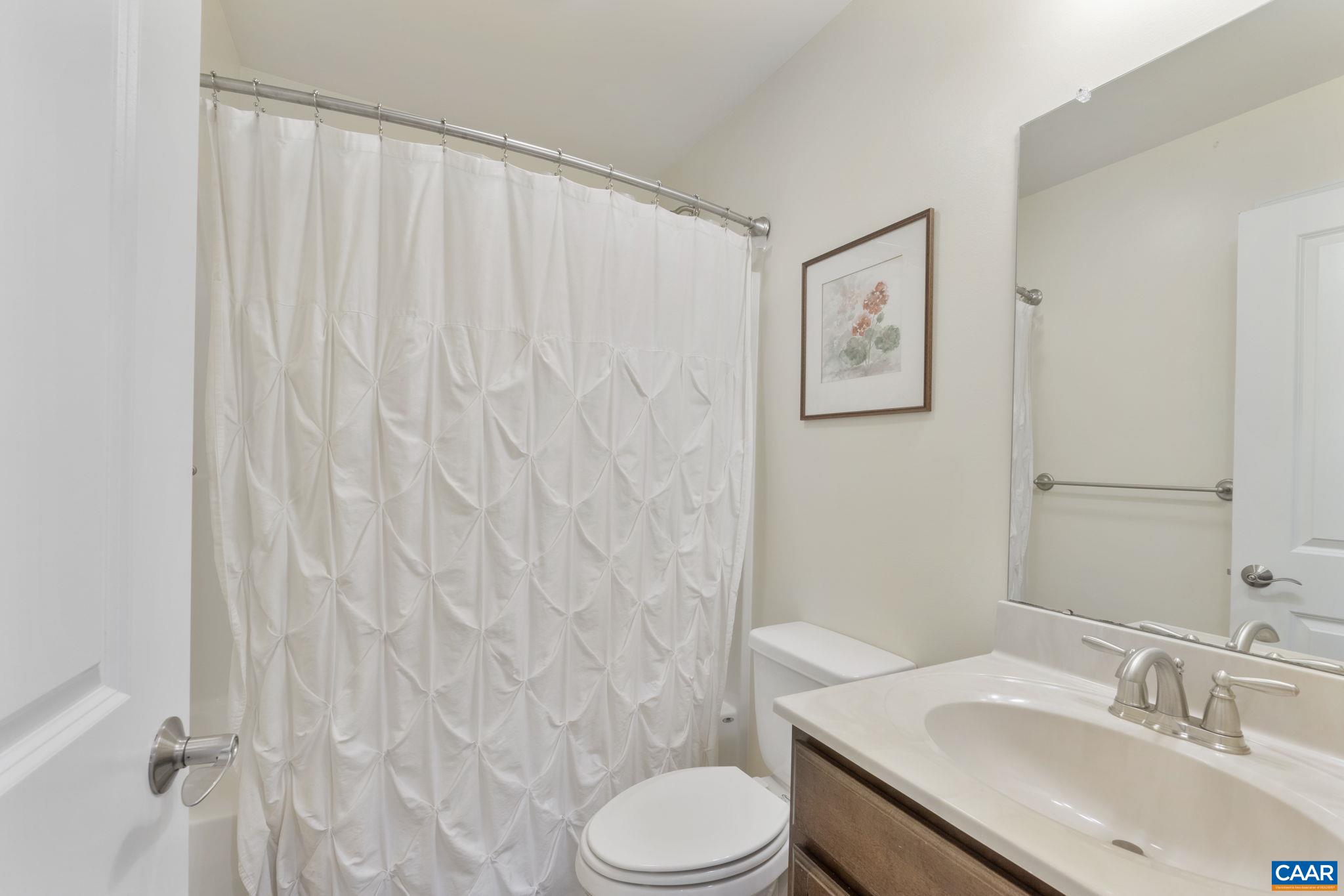 2424 Winthrop Drive Charlottesville, VA 22911 - Photo 24 of 36 a bathroom with a sink toilet and shower