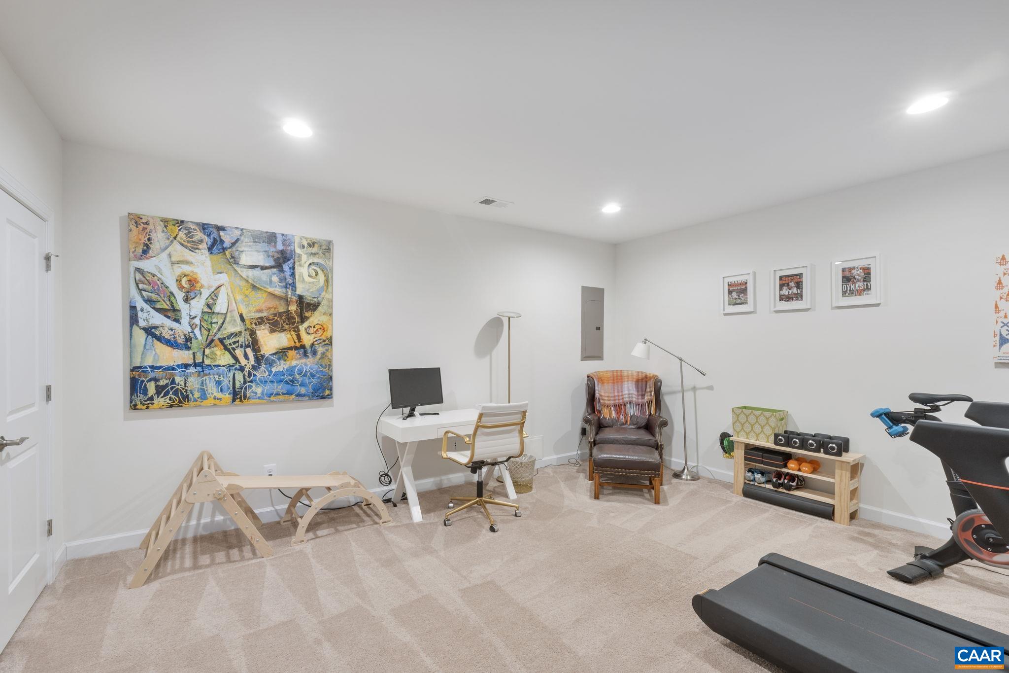 2424 Winthrop Drive Charlottesville, VA 22911 - Photo 27 of 36 a living room with furniture and a couch