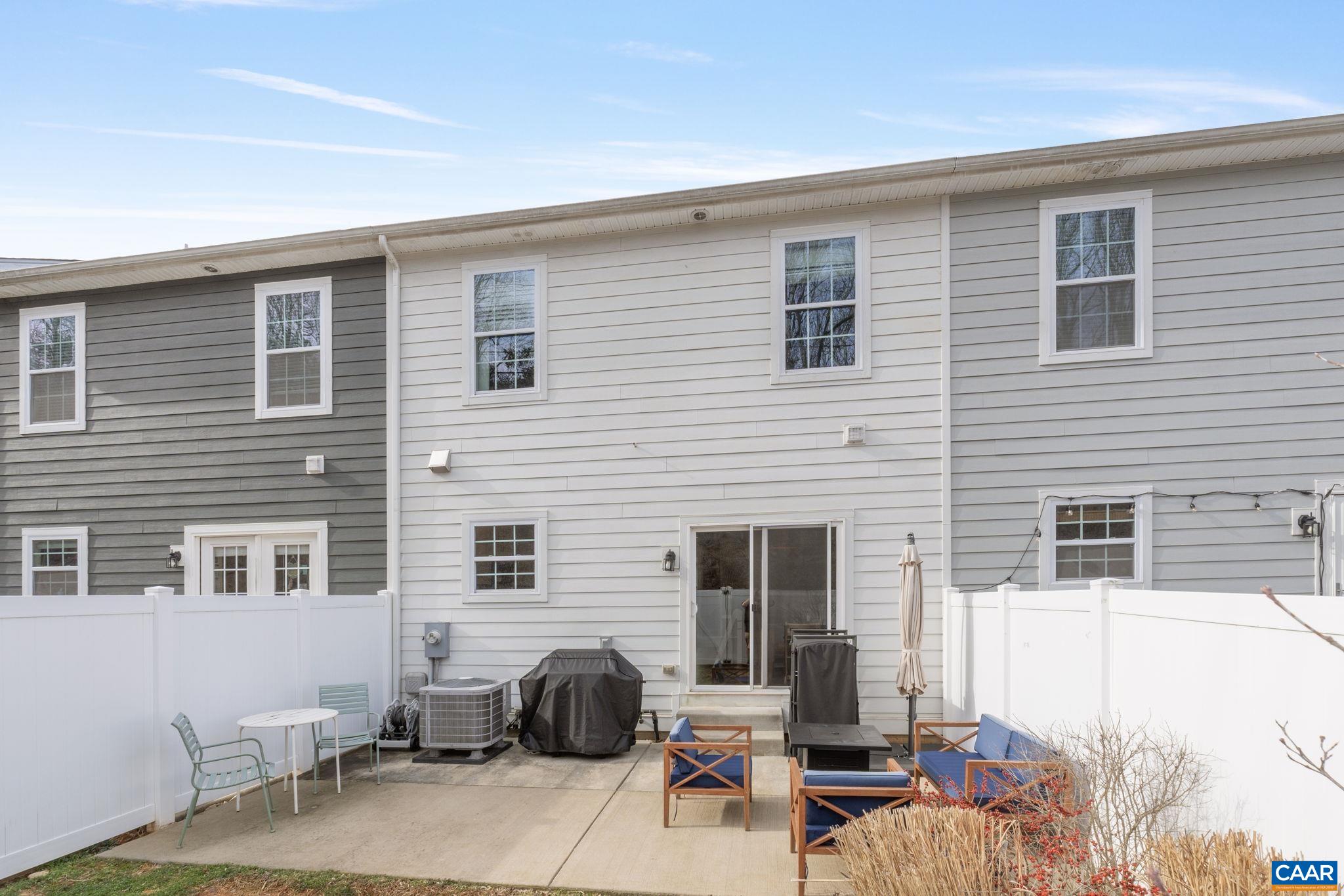 2424 Winthrop Drive Charlottesville, VA 22911 - Photo 33 of 36 a backyard of a house with outdoor seating