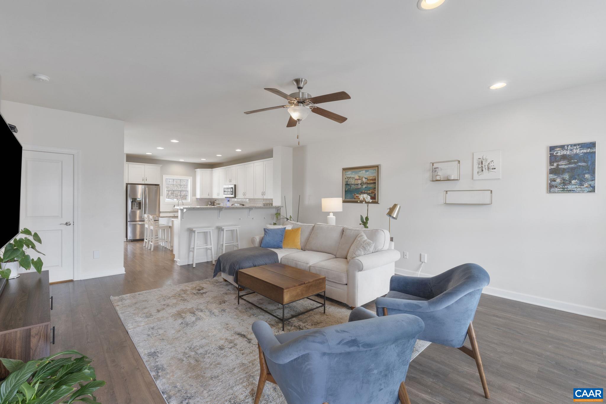 2424 Winthrop Drive Charlottesville, VA 22911 - Photo 9 of 36 a living room with furniture and kitchen view