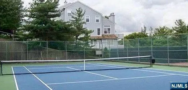 a view of a tennis court with a small court