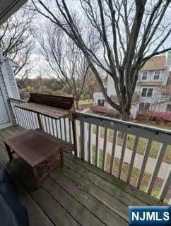 a view of a wooden roof deck