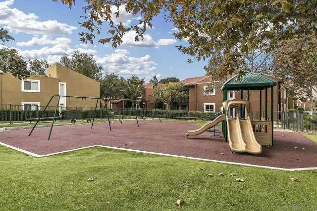 a view of a park with swings