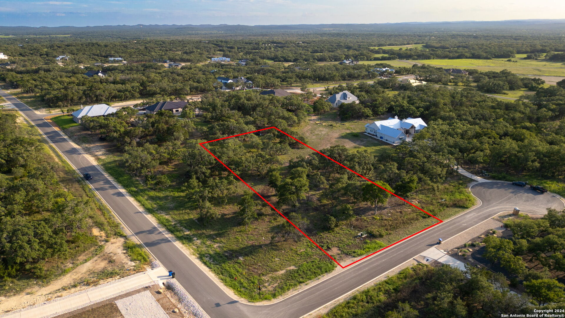 a view of a lake from a city view