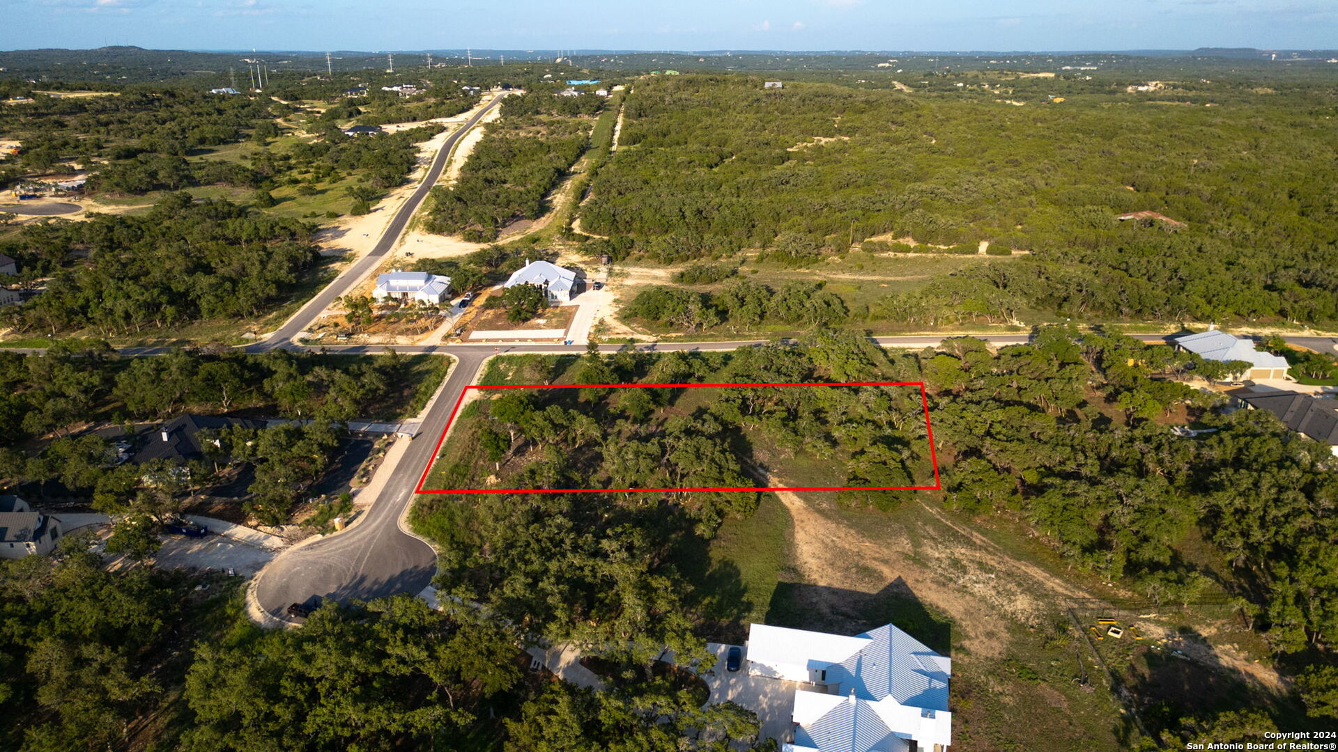 711 Blaze Rdg Boulevard Bulverde, TX 78163 - Photo 13 of 16 a view of an ocean and a houses