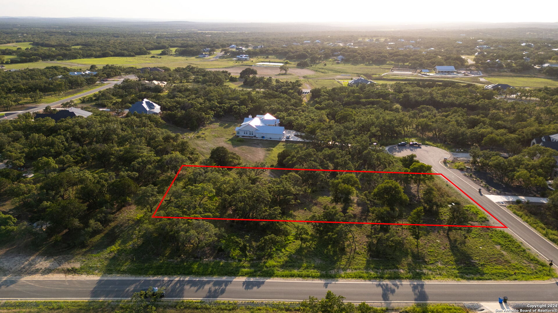711 Blaze Rdg Boulevard Bulverde, TX 78163 - Photo 3 of 16 an aerial view of town with residential houses with outdoor space and swimming pool