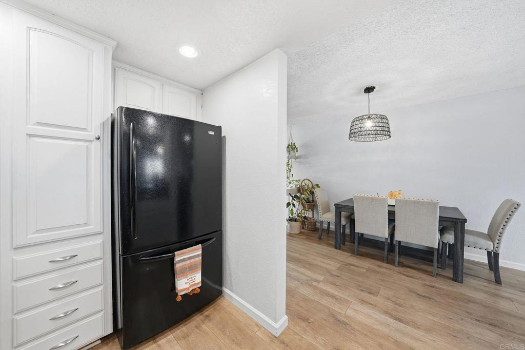 3711 Balboa Terrace, Unit B San Diego, CA 92117 - Photo 12 of 39 a view of a livingroom with furniture and wooden floor