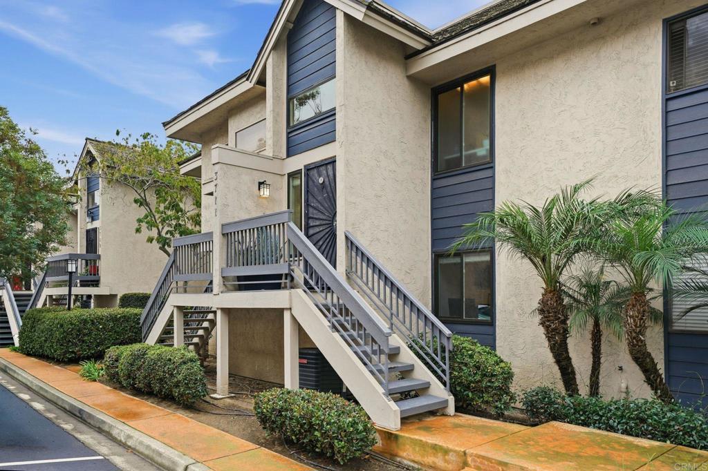 3711 Balboa Terrace, Unit B San Diego, CA 92117 - Photo 16 of 39 a front view of a house with a yard
