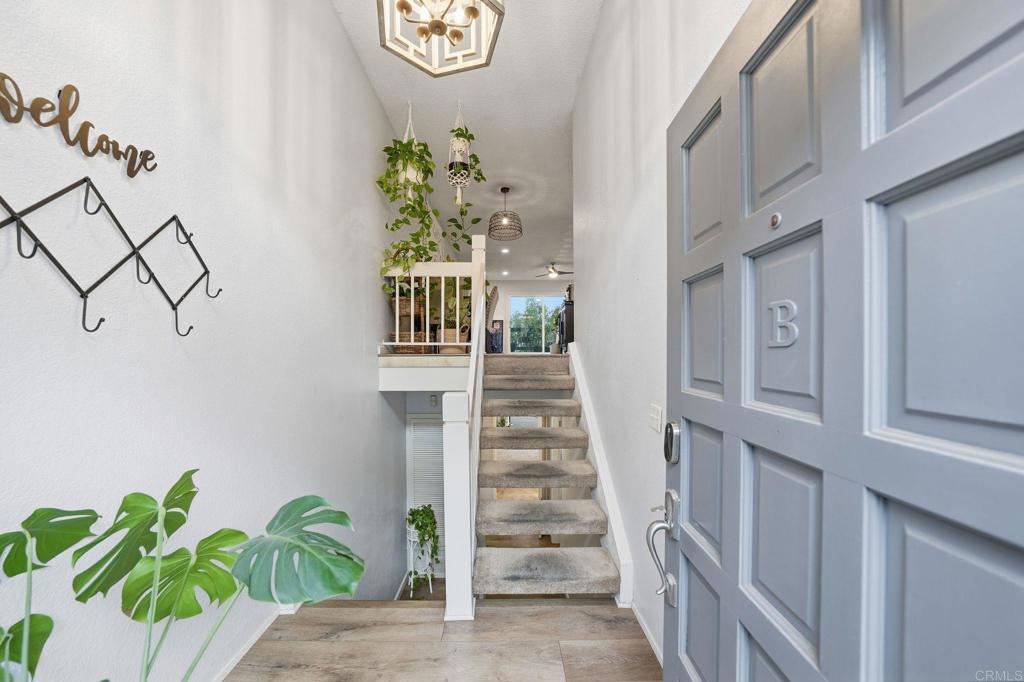 3711 Balboa Terrace, Unit B San Diego, CA 92117 - Photo 17 of 39 a view of entryway with paintings on the wall