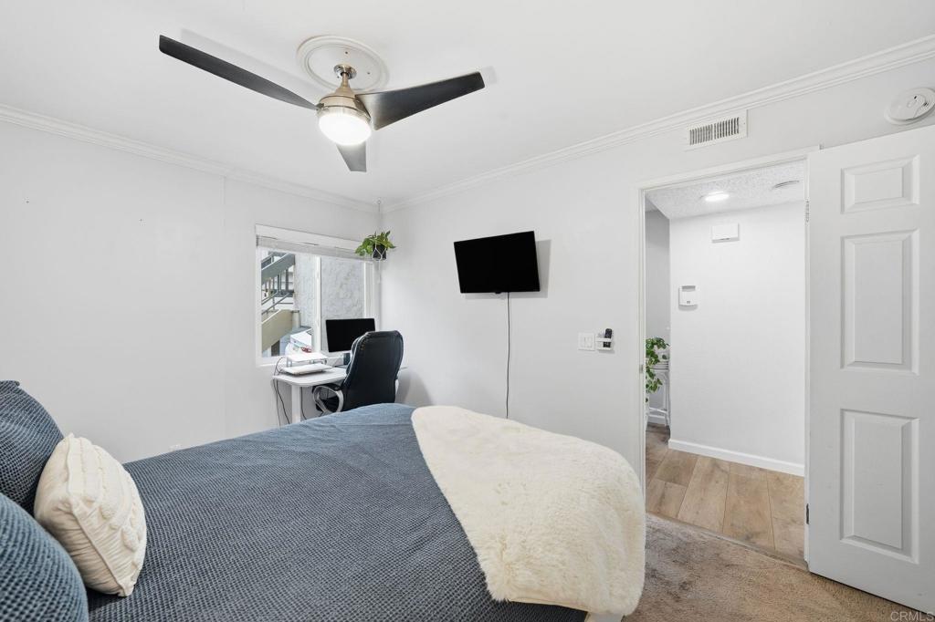 3711 Balboa Terrace, Unit B San Diego, CA 92117 - Photo 20 of 39 a living room with furniture and a flat screen tv