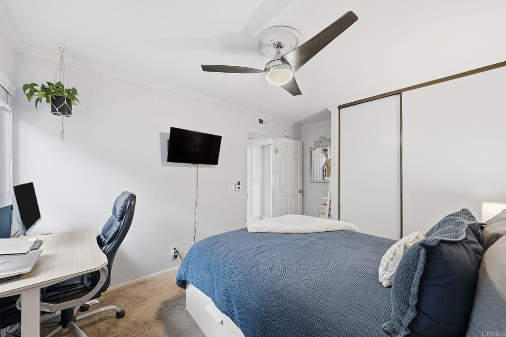 3711 Balboa Terrace, Unit B San Diego, CA 92117 - Photo 21 of 39 a bedroom with a workspace