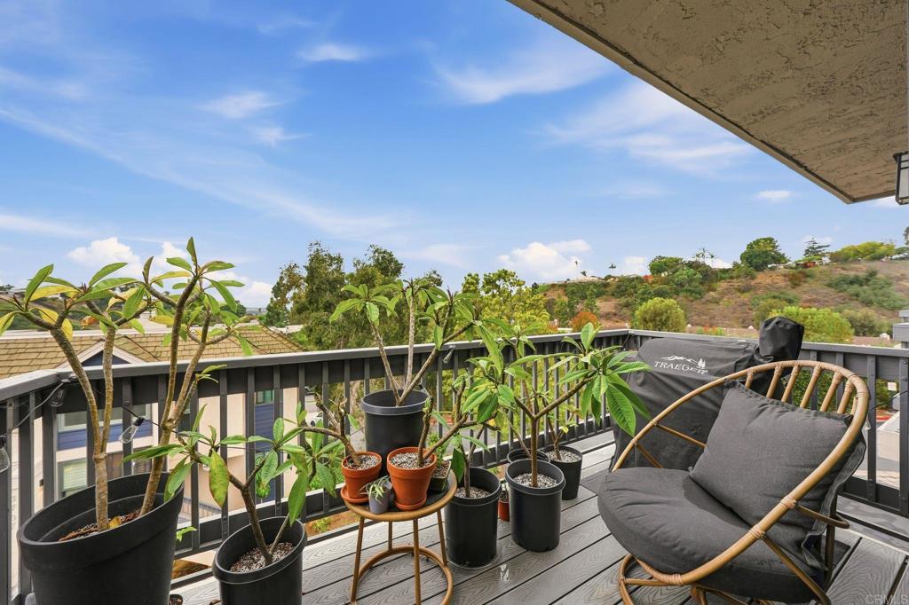 3711 Balboa Terrace, Unit B San Diego, CA 92117 - Photo 32 of 39 a view of a chairs and table in patio