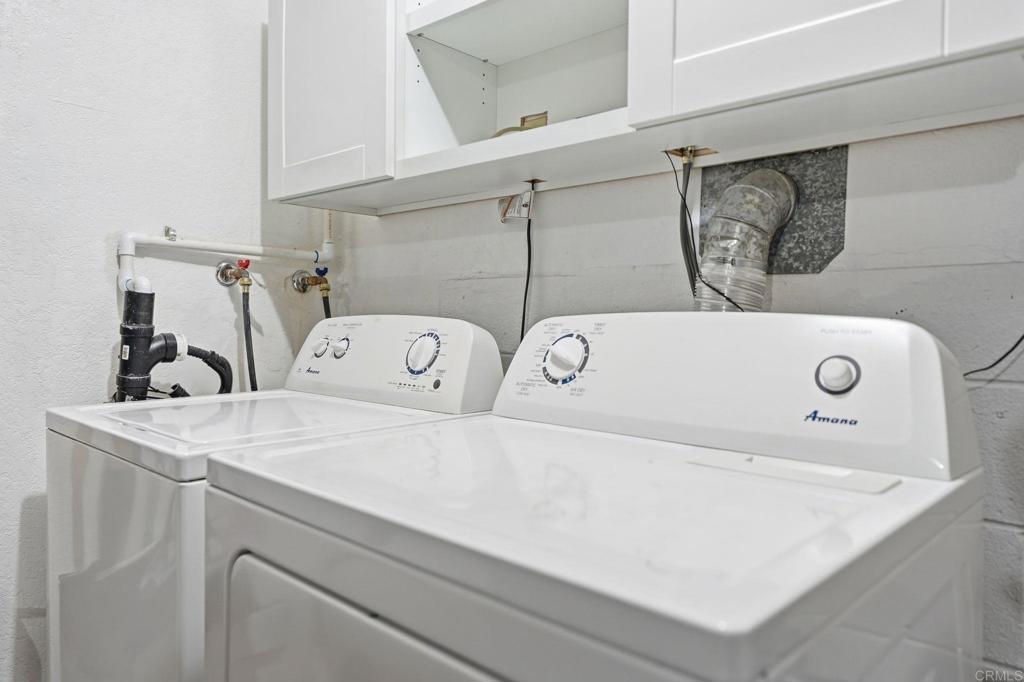 3711 Balboa Terrace, Unit B San Diego, CA 92117 - Photo 35 of 39 a utility room with dryer and washer