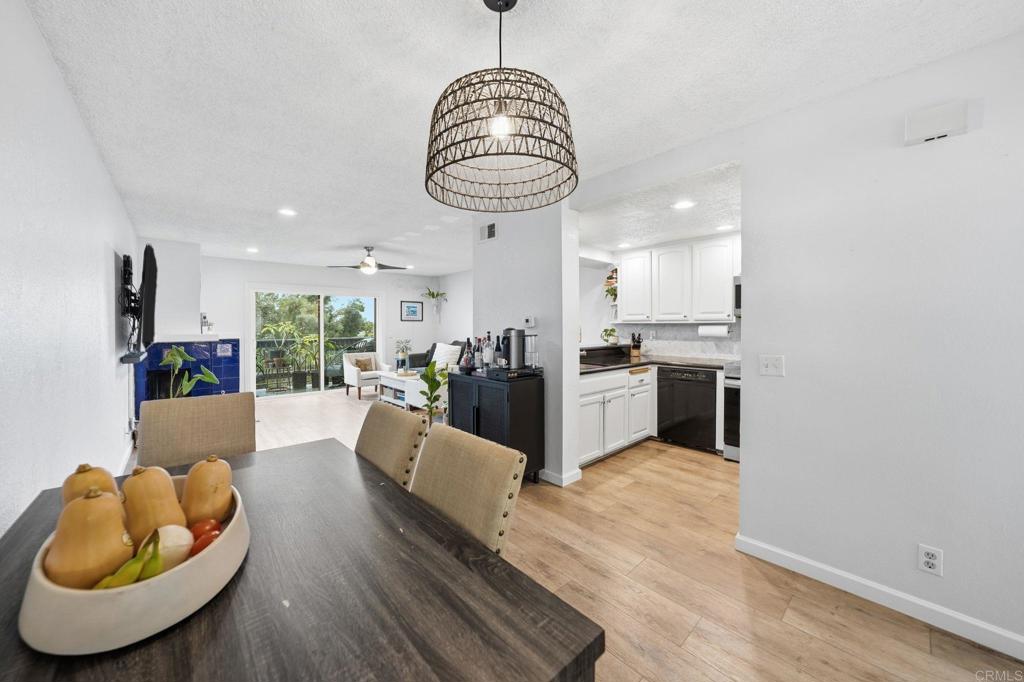 3711 Balboa Terrace, Unit B San Diego, CA 92117 - Photo 6 of 39 a living room with furniture and kitchen view