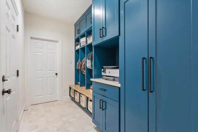 a hallway with cabinets