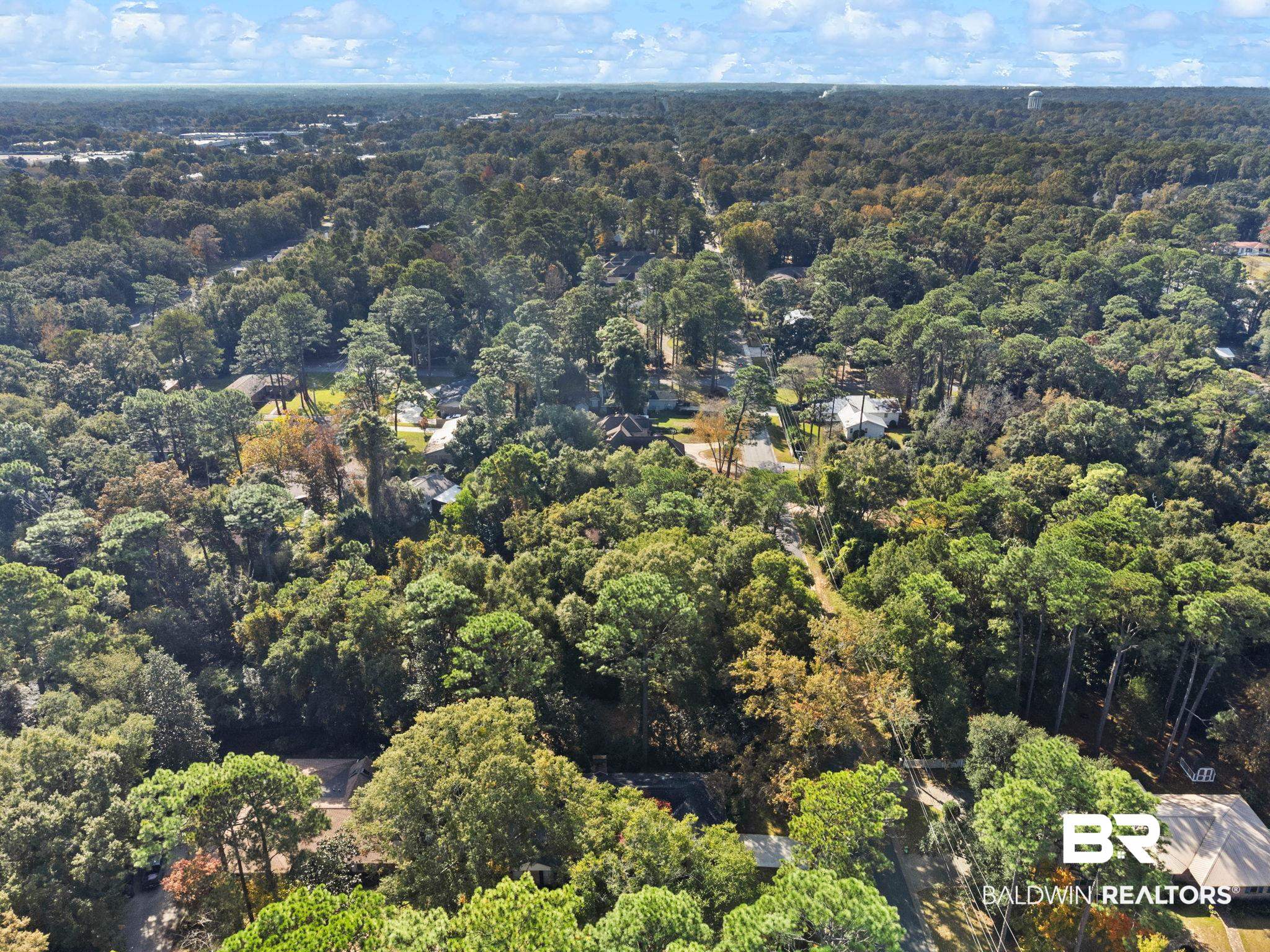 752 Evergreen Street Fairhope, AL 36532 - Photo 48 of 100 Aerial view of property's location with a heavily wooded area