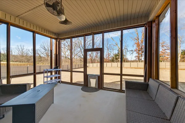 a picture of a kitchen with a refrigerator