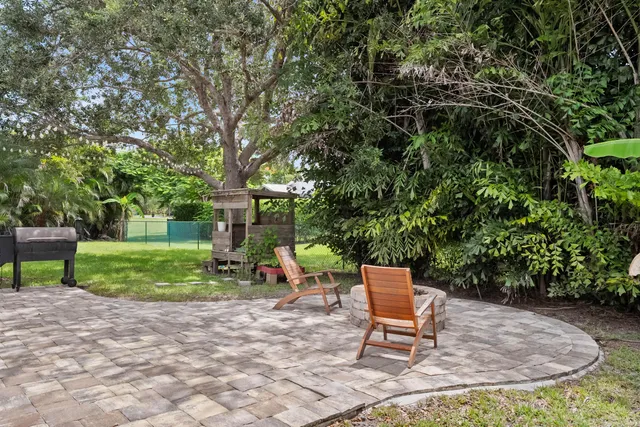 a view of a bench in a garden