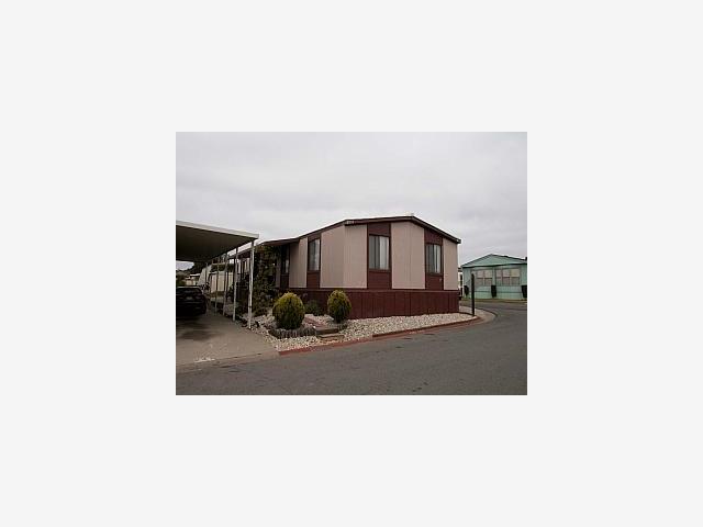 255 Bolivar, Unit 244 Salinas, CA 93906 - Photo 1 of 1 a picture of a living room with a rug