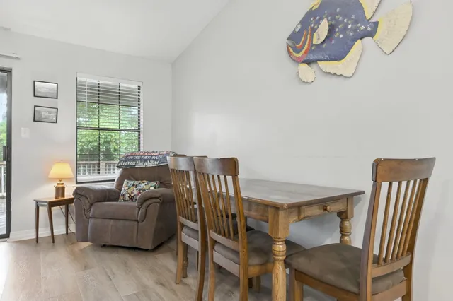a bedroom with a large bed and a ceiling fan
