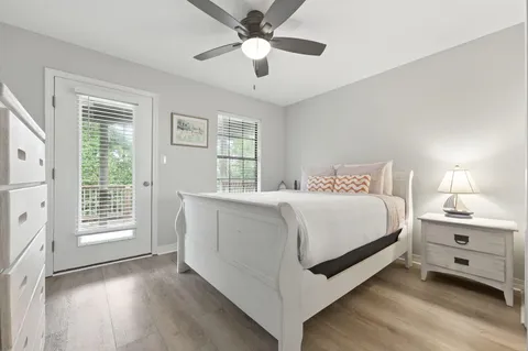 a bedroom with a bed and a tv