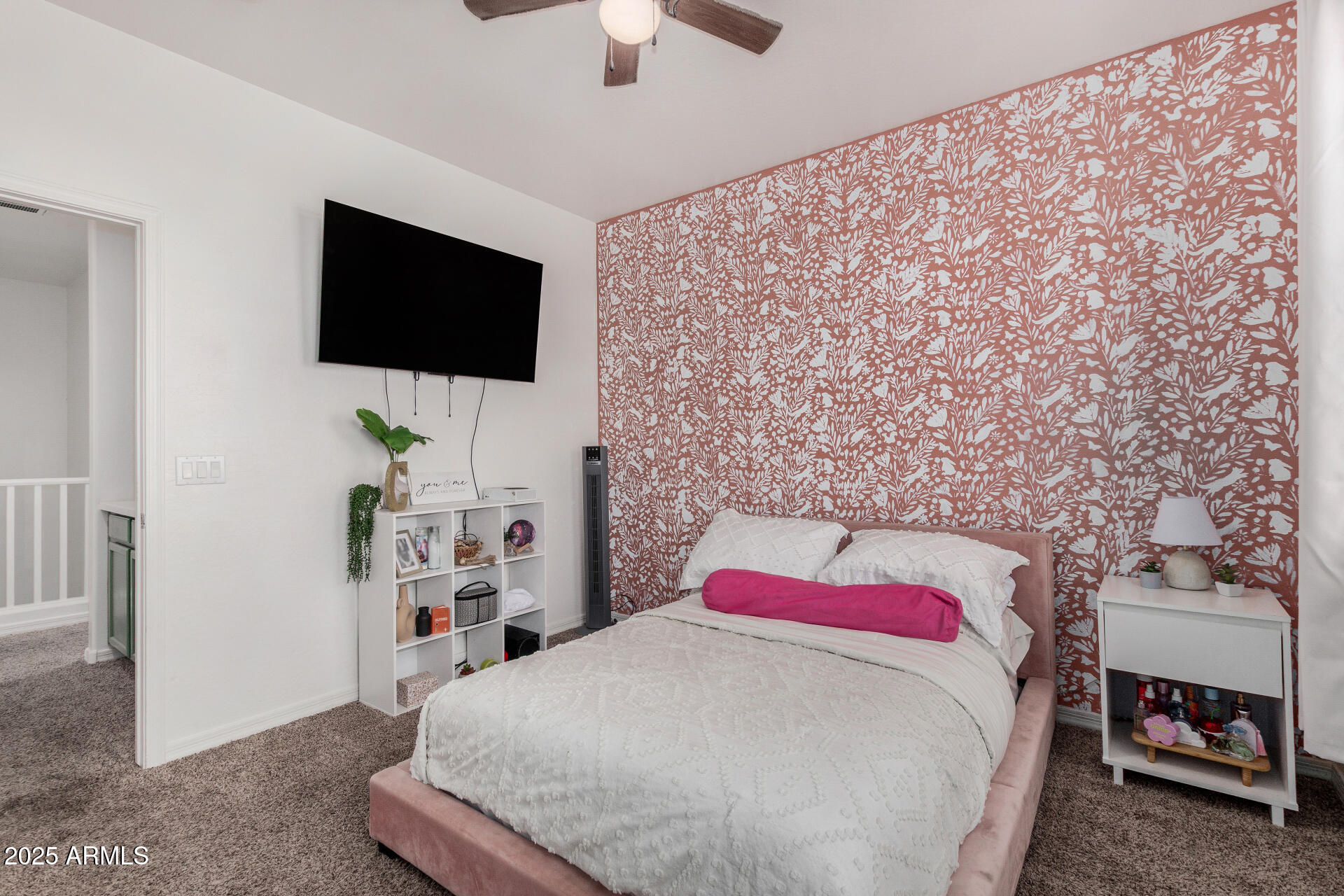 1732 South Desert View Place Apache Junction, AZ 85120 - Photo 11 of 15 a bedroom with a bed and a flat screen tv