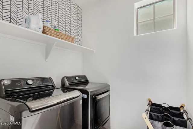 a view of storage and utility room with racks on the wall