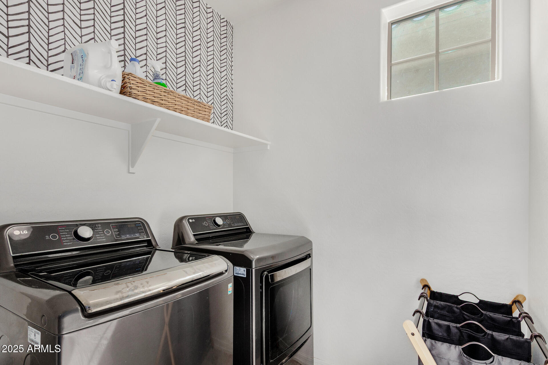1732 South Desert View Place Apache Junction, AZ 85120 - Photo 13 of 15 a view of storage and utility room with racks on the wall