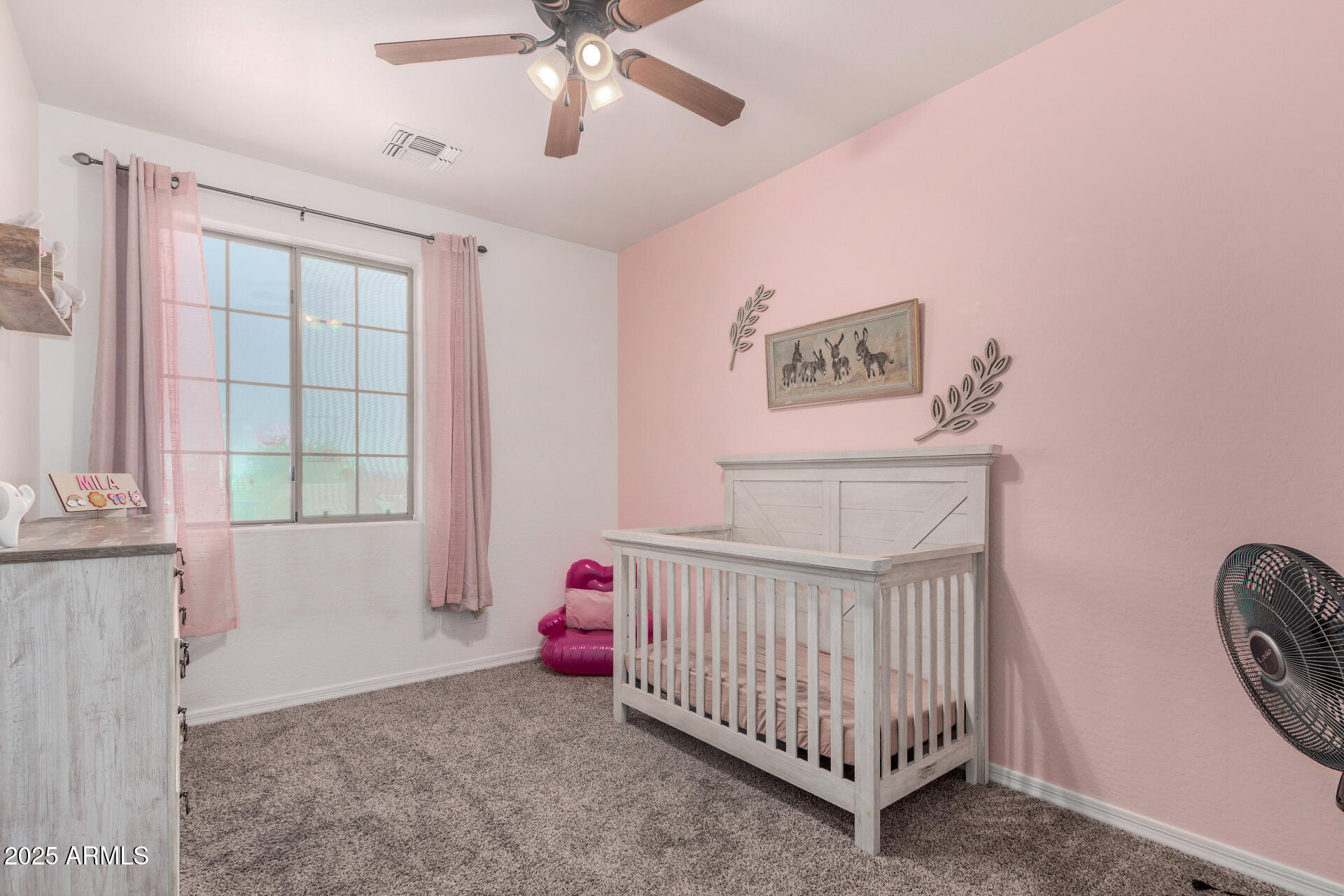 1732 South Desert View Place Apache Junction, AZ 85120 - Photo 9 of 15 a bedroom with a bed and a window